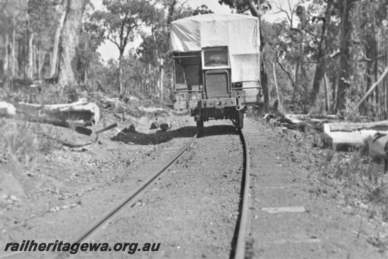 P23022
Millars custom built rail motor used to deliver pays to Hoffman and Nanga Brook mills, near Yarloop, SWR line, end view from trackside
