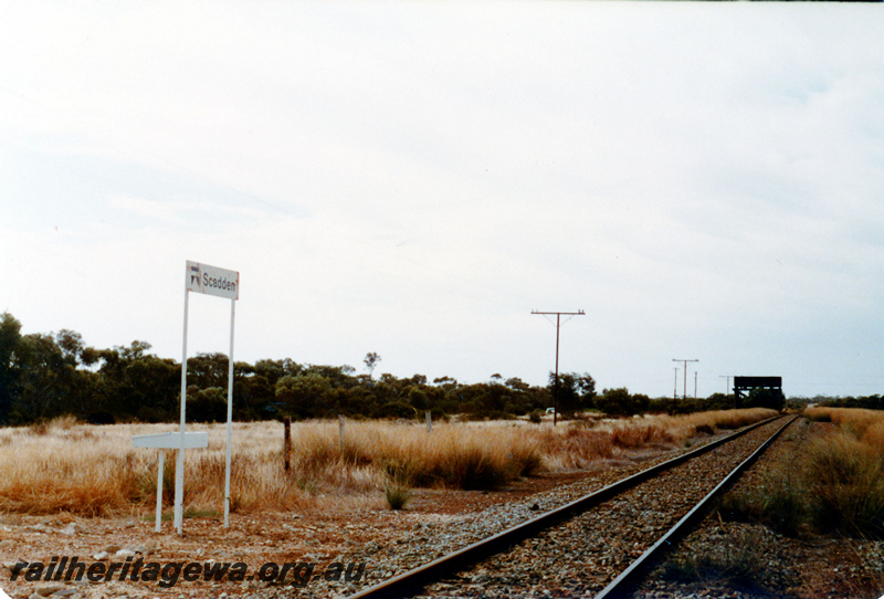 P23060
Station name sign, water tower, track, Scaddan, CE line, trackside view

