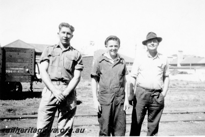 P23084
Photo of 3 rail workers - (left to right) Horrie Peet, Clive Evans, and Jack Callaghan - in the loco yards, Mullewa, EM line
