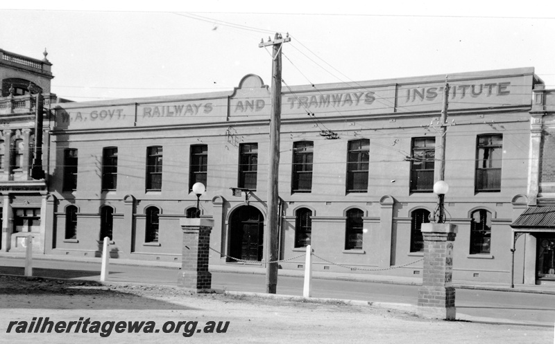 P23118
W. A. Railways and Tramways Institute building, Wellington Street, Perth, view of facade from street level
