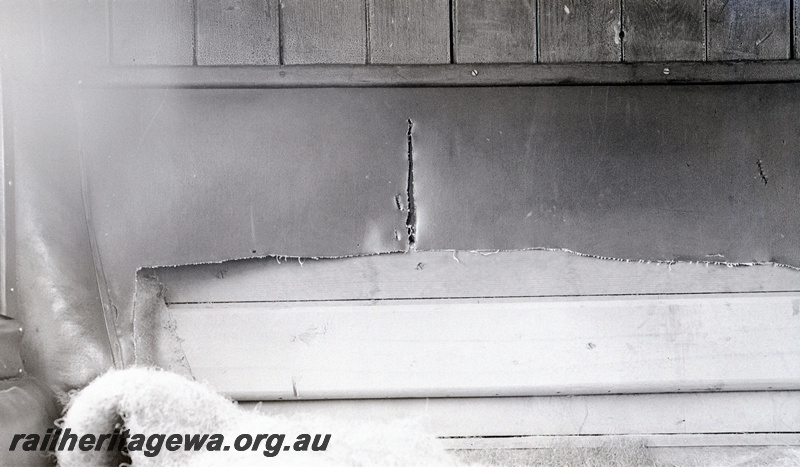 P23155
1 of 2 views of AF class 133 carriage, damage to  carriage seats during wartime, close up view
