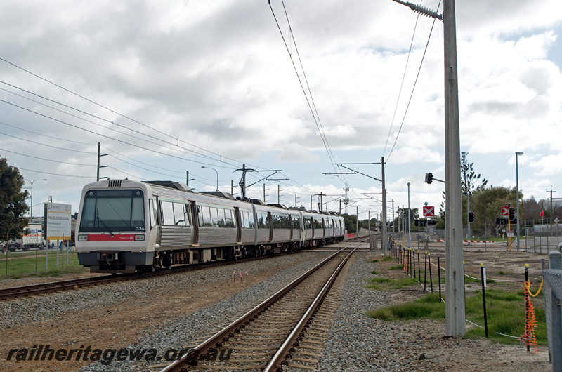 P23175
A series EMU set 36, level crossing, Welshpool, SWR line, end and side view
