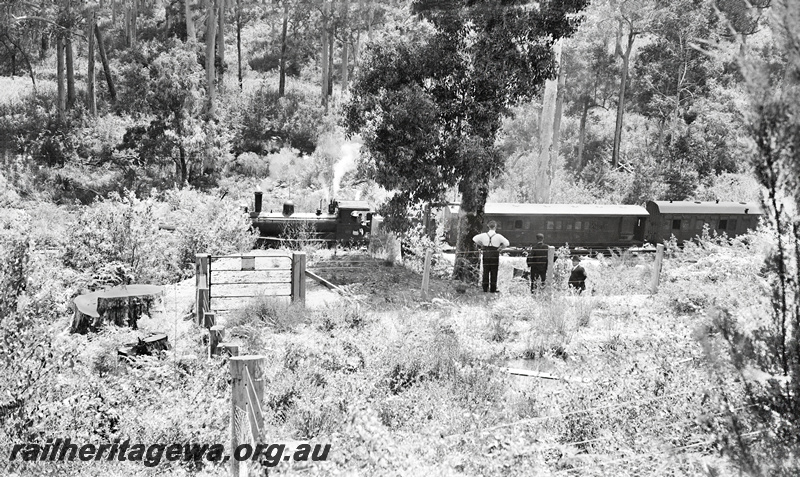 P23292
Commissioners South West Inspection Tour train hauled by former WA Land Company's  T class 170 with carriages AM 313, AL 39, AP and AD brake coach, at the railway dam south of Pemberton,  PP line 
