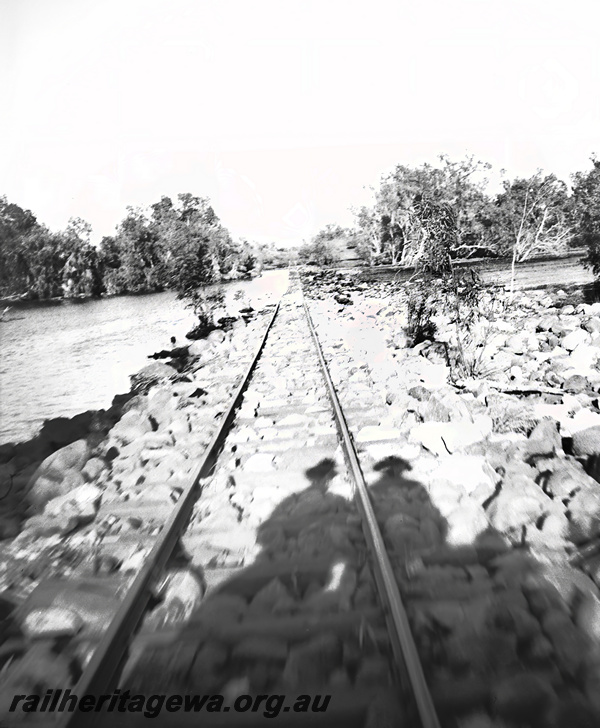P23491
Washaway, track partially under water, PM line, view along the track.
