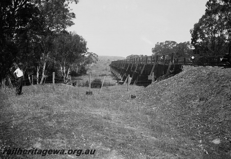 P23602
Wooden trestle bridge, spanning Dale River, onlooker, GSR line, view from trackside bank, scanned from neg 371
