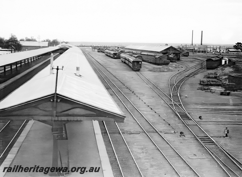 P23616
Platforms, tracks, canopies, goods shed, yard, sidings, assorted carriages and wagons, Kalgoorlie station, EGR line, view from elevated position
