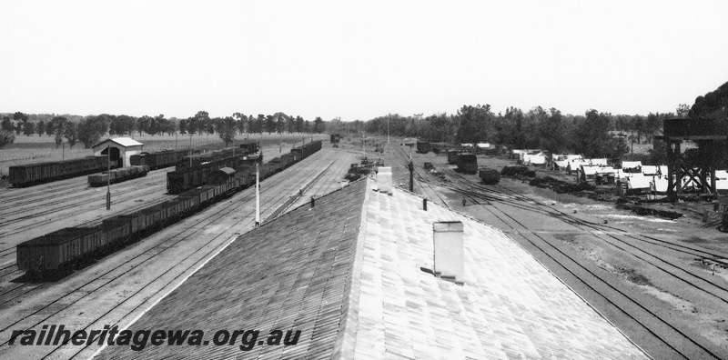 P23639
Station yard, wagons, shed, signal, tents, roof of station building, Brunswick Junction, SWR line, elevated view
