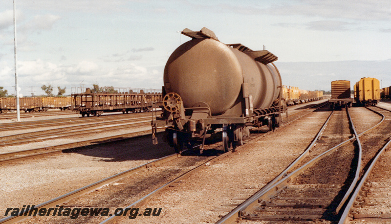 P23646
WJP class standard gauge bogie tank wagon, other wagons and vans, Midland ER line, end and side view
