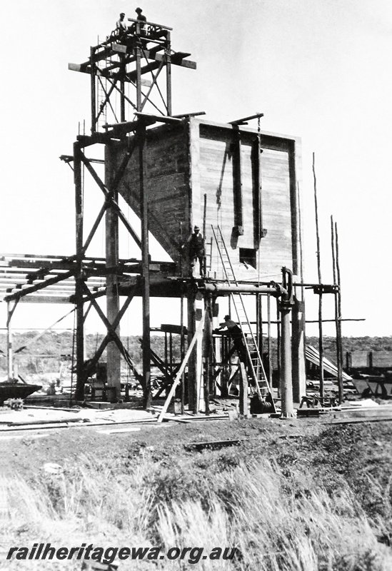 P23662
Coal stage under construction, 2 of 4, ladder, workers, Caron, EM line, view of whole structure from ground level
