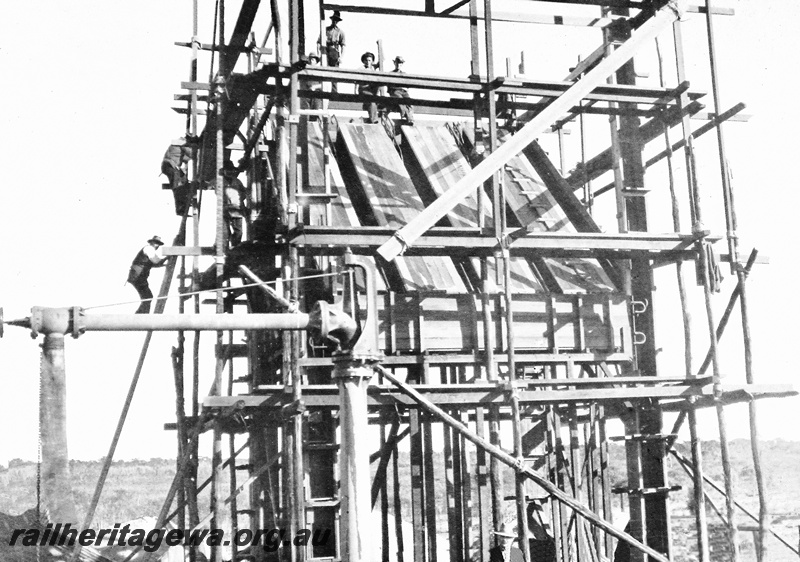 P23664
 4 of 4 of Coal stage under construction, Caron, EM line, workers on ladder, water crane, close up view
