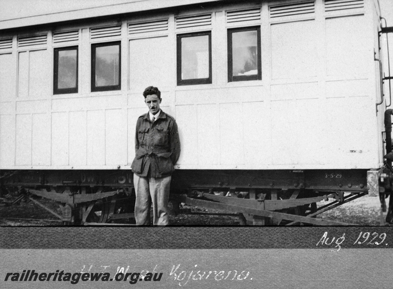 P23668
DW class carriage 5182, man with initials HTW standing in front of carriage, Kojarena, NR line, side view
