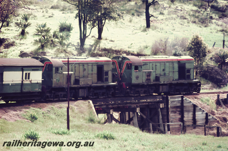 P23675
MRWA F classes 45 and 44 double heading ARHS tour train to Dwellingup, crossing wooden trestle culvert, PN line, end and side view
