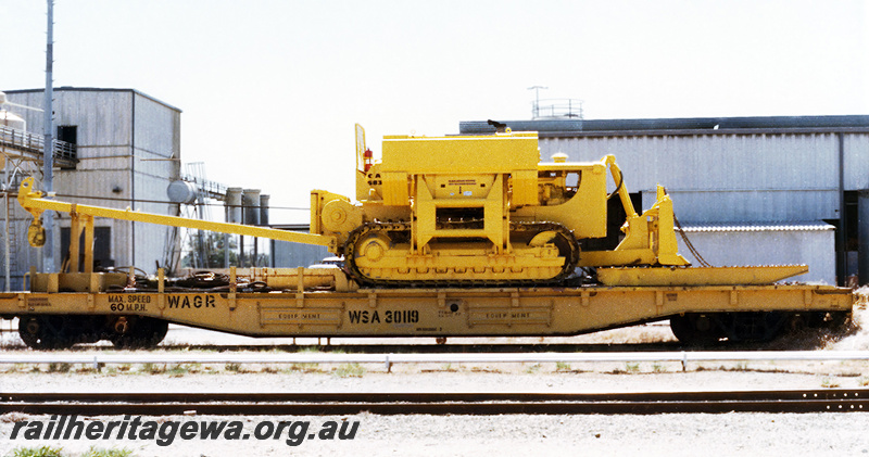 P23721
WSA class 30119 standard gauge breakdown flat wagon fitted with wreck master tractor crane - side view.
