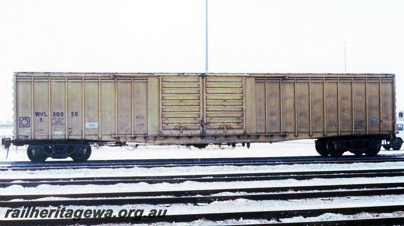 P23733
WVL class 30828 standard gauge covered goods van fitted with load dividing bars - side view
