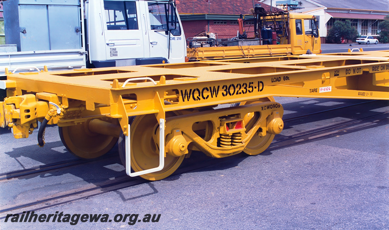 P23751
WQCW class flat wagon 30235-D (one end), end and side view, close up of bogie, coupling, steps
