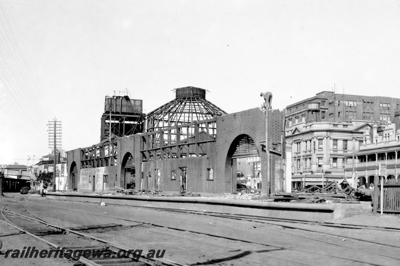 P23774
Perth Goods Yard, water tower, partially demolished Perth Markets, view along the yard looking east, Bairds store in the right hand side background
