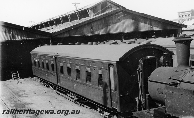 P23775
AZ class first class sleeping carriage, Carriage Sheds, Perth , being shunted by a N class loco, side and end view
