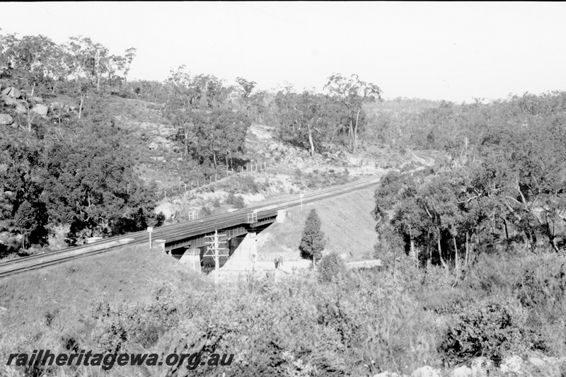 P23780
Steel girder bridge on concrete pylons John Forrest National Park, elevated overall view of the location looking west
