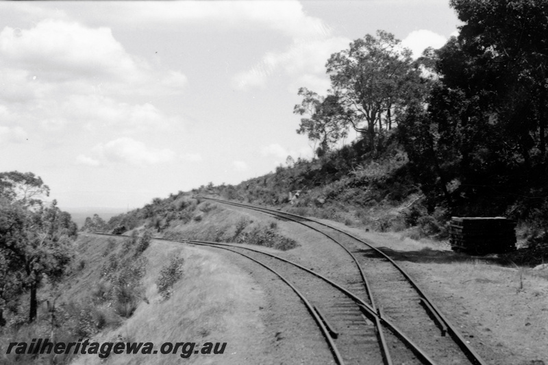 P23782
Points at the diverging tracks, stacks of sleepers trackside UDRR line, view looking along the line
