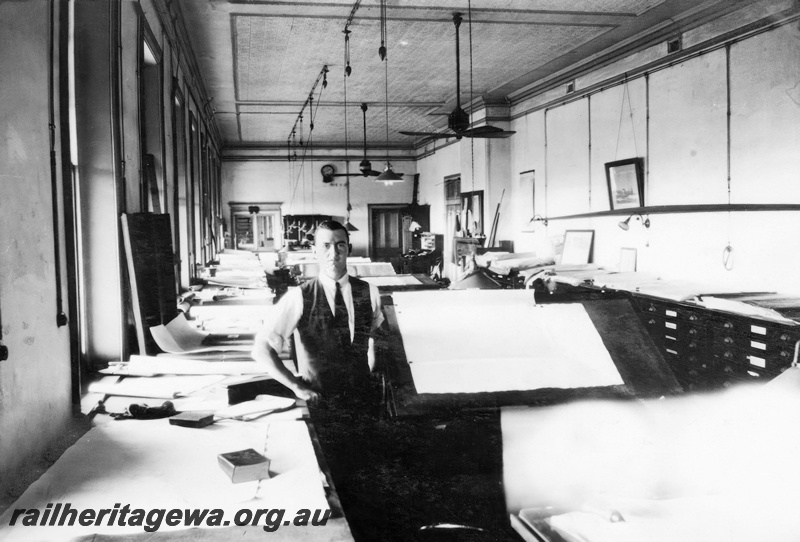 P23798
Drawing Office, Midland Workshops, view along the room showing the drawing boards, an official standing in the aisle
