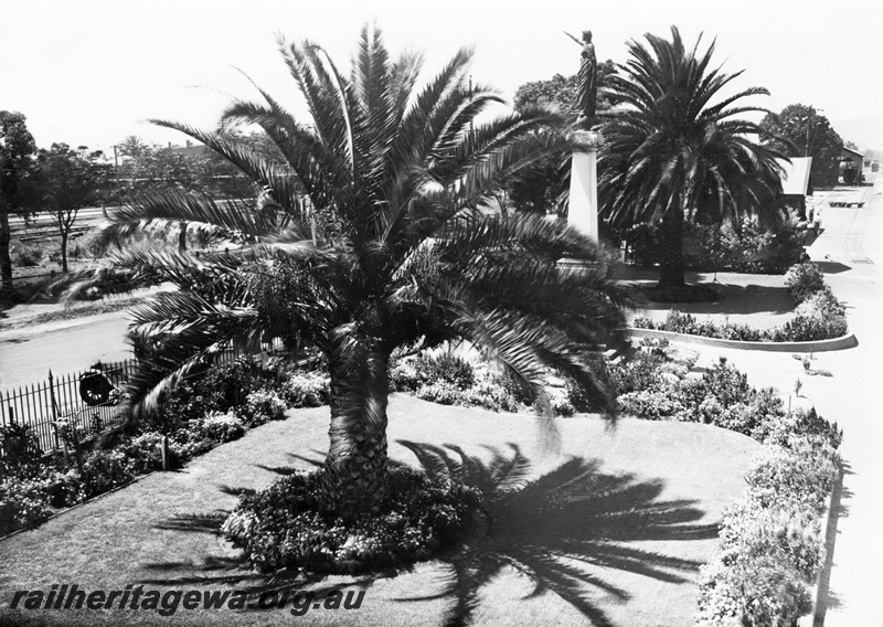P23810
Garden of the office of the Chief Mechanical Engineer, Peace Monument, lawns, palms, Midland Workshops, ER line, elevated view
