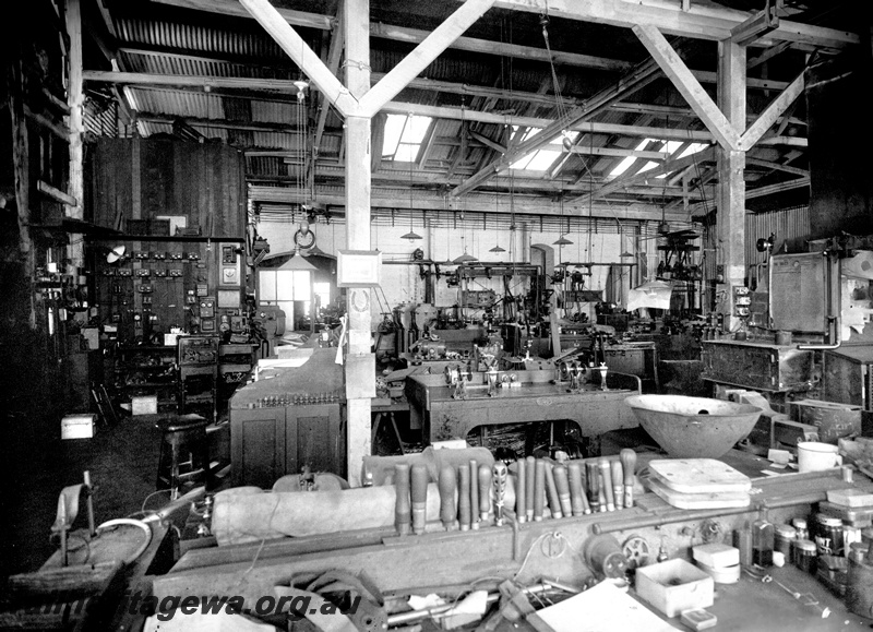 P23836
Electrical shop, wooden supporting posts and beams, benches, various machinery, Midland workshops, Midland, ER line, interior view
