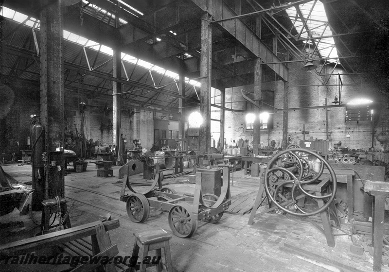 P23837
Coppersmith shop, wagon, benches, machinery, steel posts and girders, Midland workshops, Midland, ER line, general interior view
