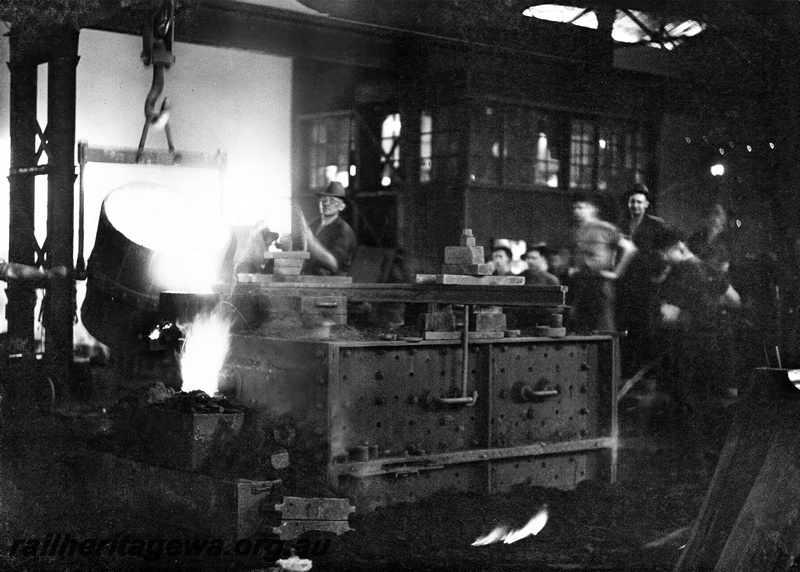 P23840
Pouring castings, bucket of molten metal, workers, glass-paned office, Midland workshops, Midland, ER line, interior view
