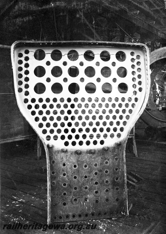 P23852
Tube plate from boiler 284, from FS class 290, lit up without water in boiler in 19381200, Midland workshops, Midland, ER line, close up view
