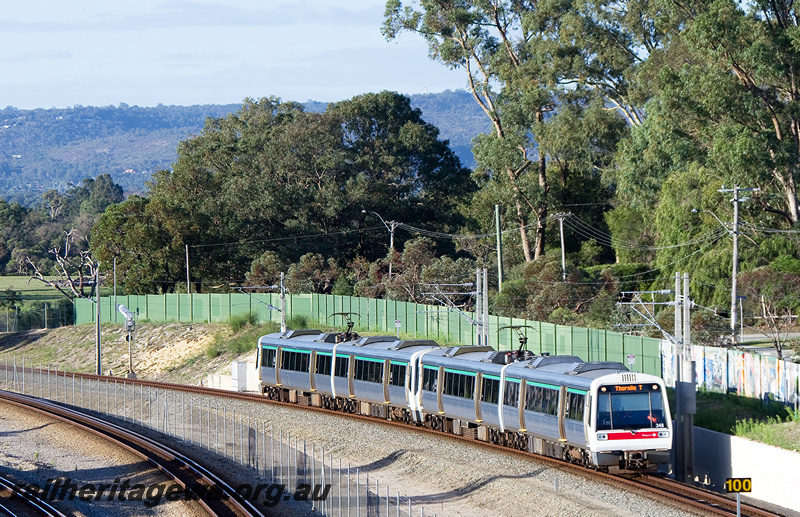 P23873
AEB class 348, AEA class 248, EMU set 48, another A series EMU set, arriving Thornlie station, single track at the time, Thornlie line, side and end view from elevated position
