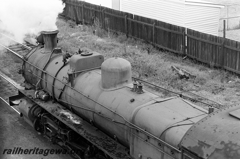 P23895
PMR class 729, trackside wooden paling fence, Bunbury, SWR line, view looking down on the passing loco from an elevated position, showing boiler
