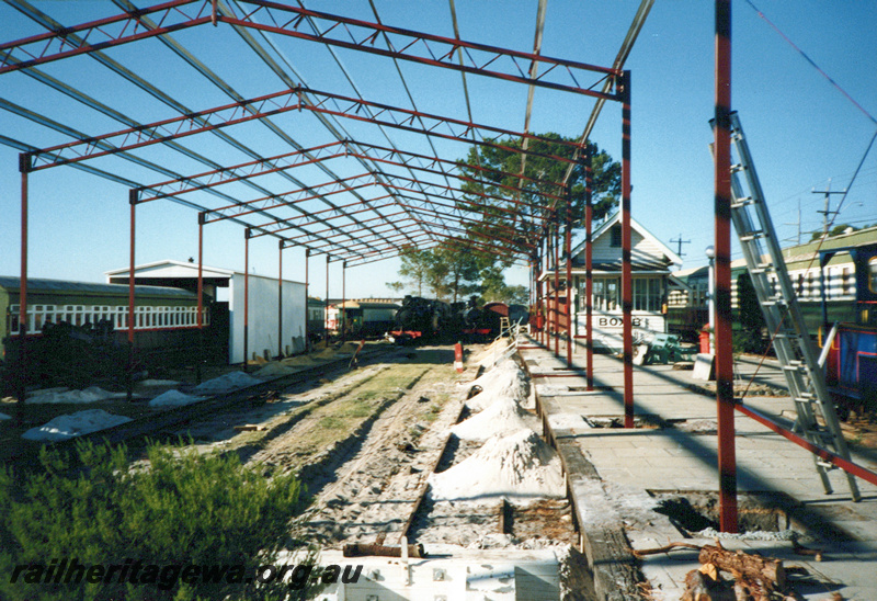 P23925
First stage of the roofing at the Rail Transport Museum under construction showing the framework before the roofing was attached, view along the platform
