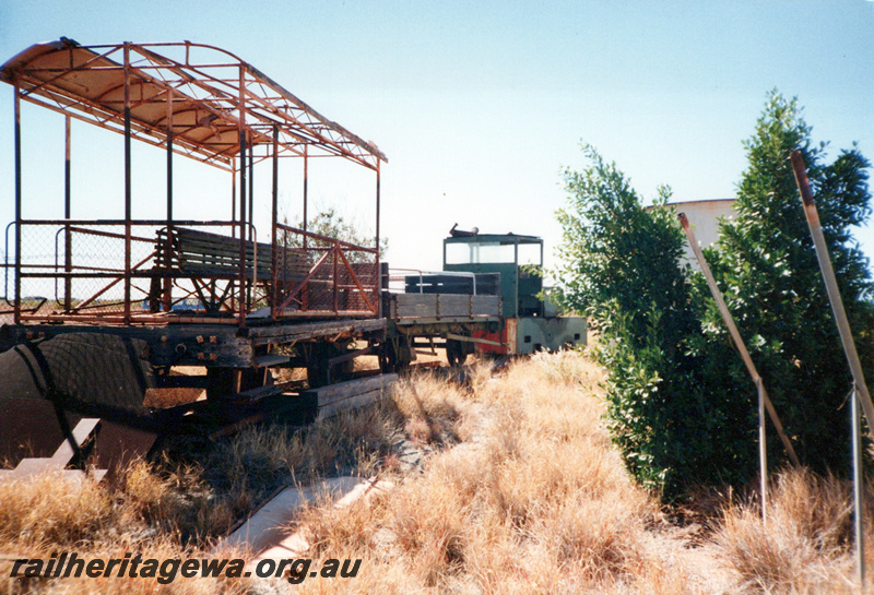 P23937
Four wheel open carriage with bench seats, H class wagon and PW class 22, 6 Mile Museum, Karratha, front and side view, See also P23926
