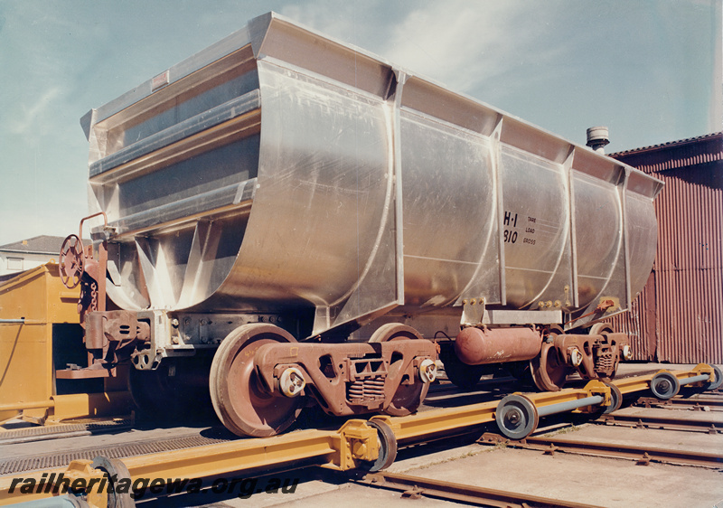 P23942
Hamersley Iron (IR) iron ore wagon on  traverser, end and side view
