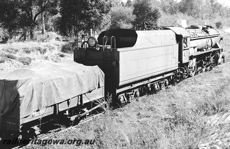 P24004
V class 1206 rear view of locomotive hauling good train, GC class wagon 9987 behind locomotive. Location unknown.  
