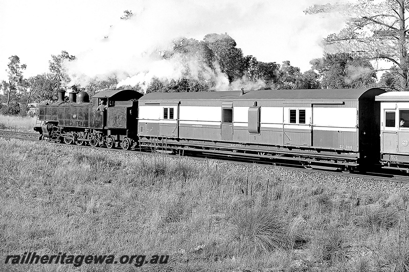 P24017
DD class 592 rear view hauling ARHS Early Morning Riser tour near Armadale -ZJ  366 brakevan behind locomotive. SWR line.
