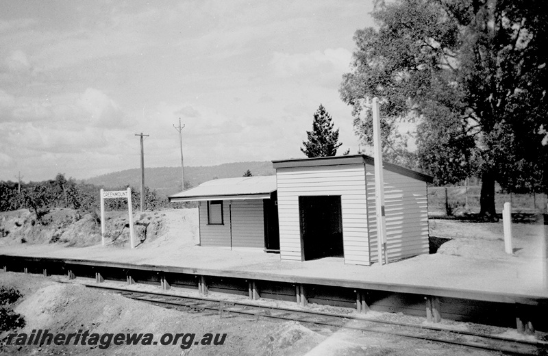 P24030
Platform, station buildings, station sign, track, tree, Greenmount, ER line, view of station from track level 
