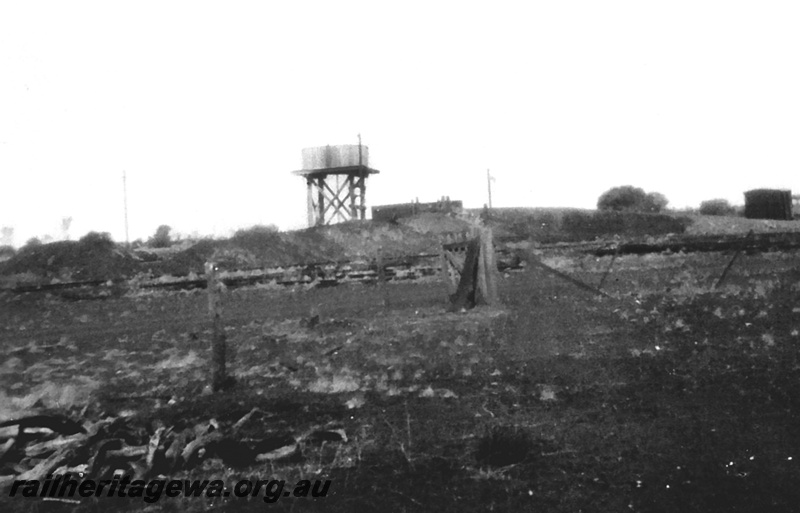 P24041
Water tower, Wiluna, NR line, view looking towards loco shed from barracks
