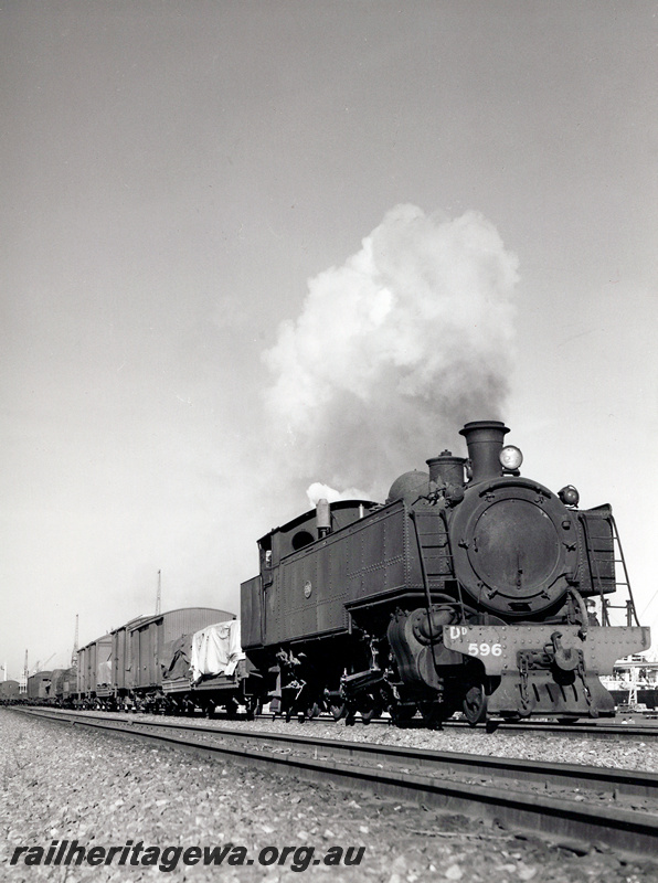 P24066
DD class 596 departing Fremantle with a Perth bound goods train. ER line. 
