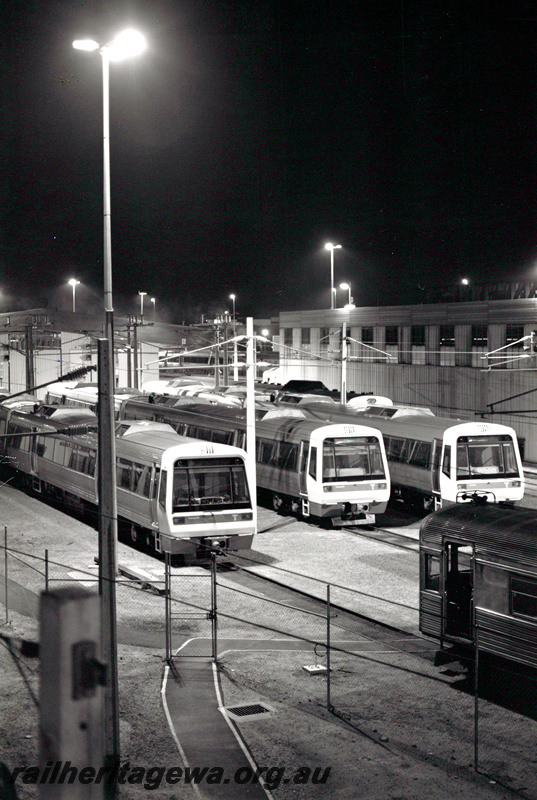 P24067
Claisbrook rail car depot. Three A series Emu in photograph and cab of ADK railcar in foreground. ER line. 
