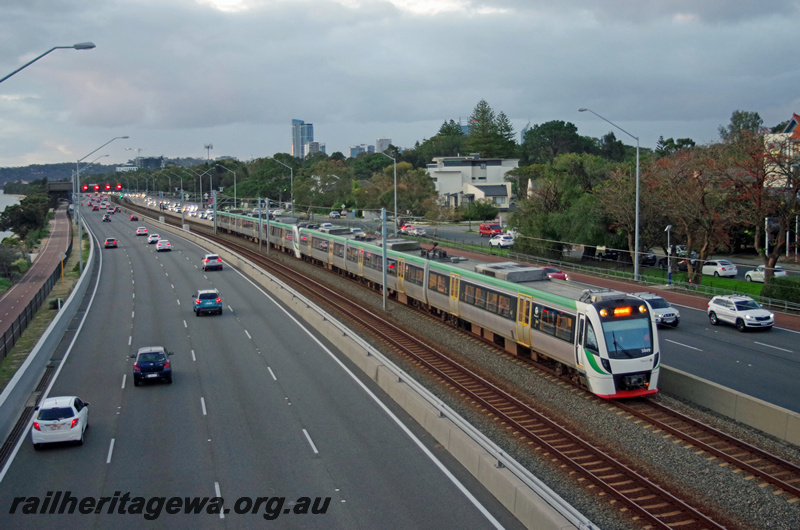 P24100
B series railcar 5049, leading B series EMU set 49, and another B series set, freeway, Como, Mandurah line, side and front view
