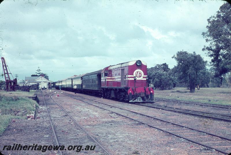 T00029
MRWA F class 43, yard crane, station building, Muchea, MR line,   ARHS Vic Div visit, view along the train.
