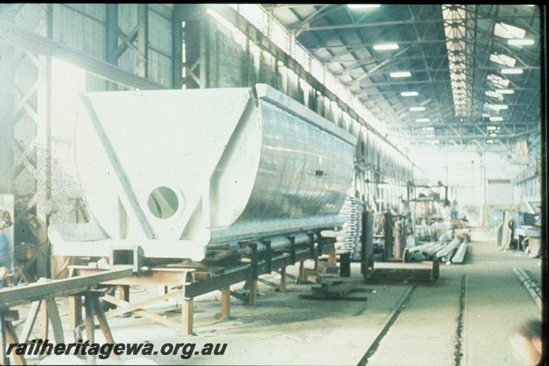 T00377
XC class bauxite wagon under construction, Flanging Shop, Midland Workshops, end and side view of body. 
