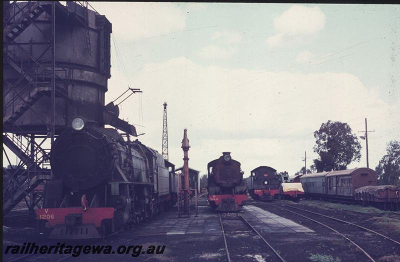 T01856
V class 1206, W class 944, DD class 596, coaling tower, V class being coaled

