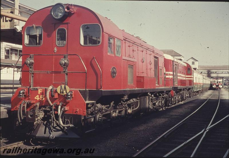 T02272
F class 45, plain red livery, F class 43, MRWA livery, coupled nose to nose,  Perth Station, ARHS tour train to Boddington, front and side view of  loco and train
