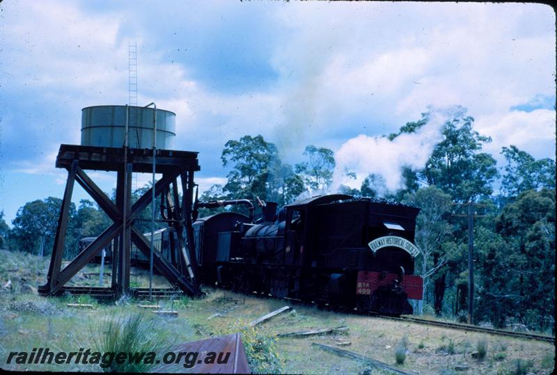 T03532
MSA class 499 Garratt loco, water tower, squatters tank, Bergining, PN line, ARHS tour train to Dwellingup.
