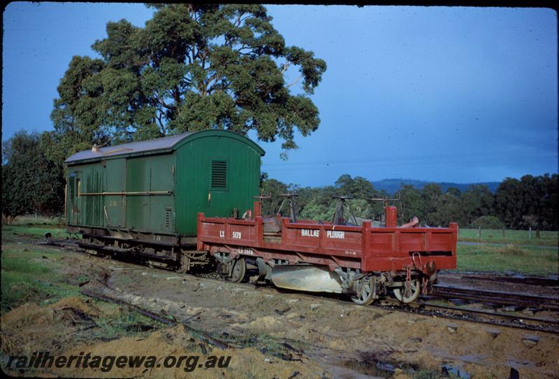 T03632
LX class 5179 6 wheel ballast plough coupled to Z van, LX in good condition brown livery, Z van in green livery with grey roof
