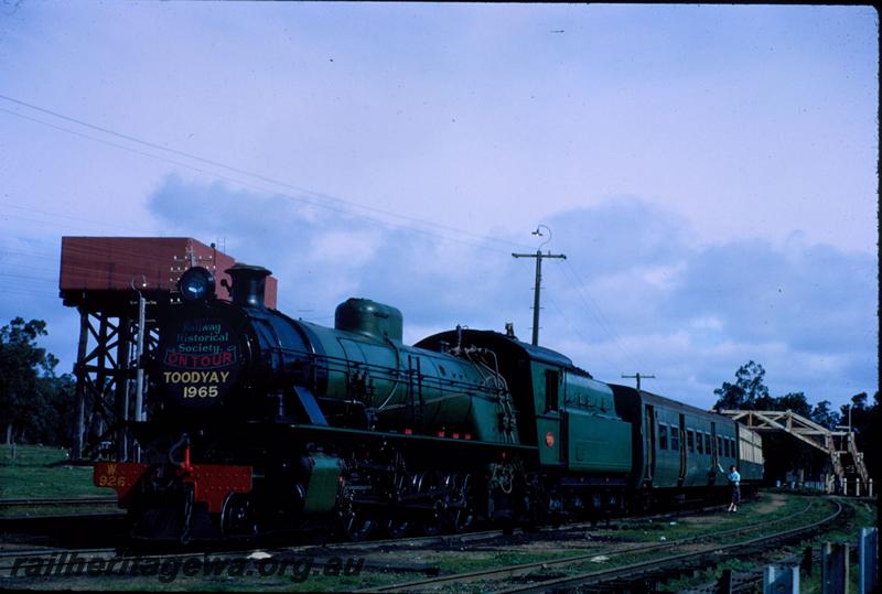 T03770
W class 926, water towers, 25,000 gallon cast iron tanks, footbridge, Chidlow, ER line, on ARHS tour train to Toodyay, AKB class 60 behind the loco
