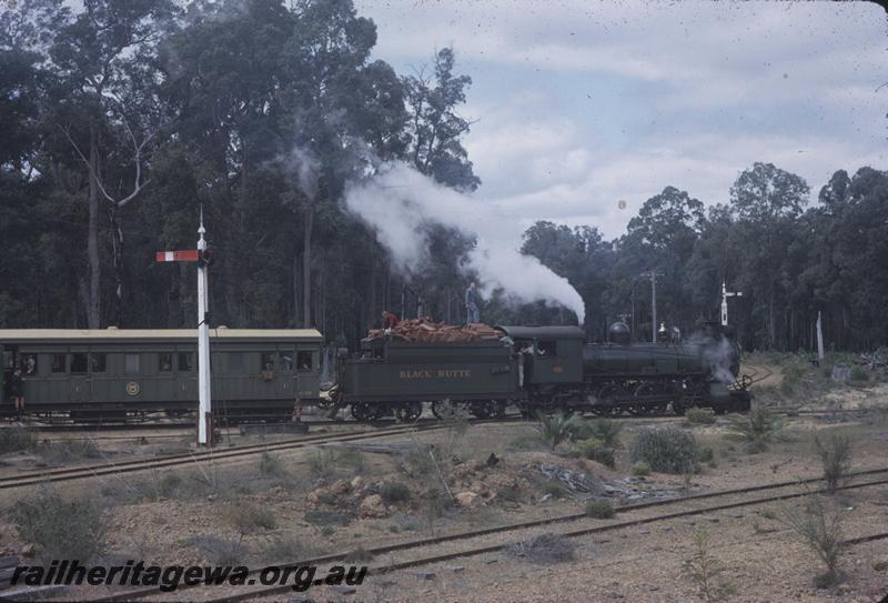 T04002
Hawker Sidderley Building Supplies loco, ex WAGR CS class 270, Black Butte on the Banksiadale timber mill line crossing over the PN line, Wuraming, AA class 206 first class carriage behind the loco,  signals on the PN line, tour train for the ARHS Vic Division Wuraming,
