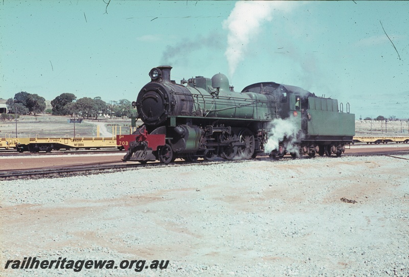 T04471
PM class 703 steam locomotive  with a PR class dome pictured at Avon Yard. In the background are standard gauge WF class flat wagons.front and side view

